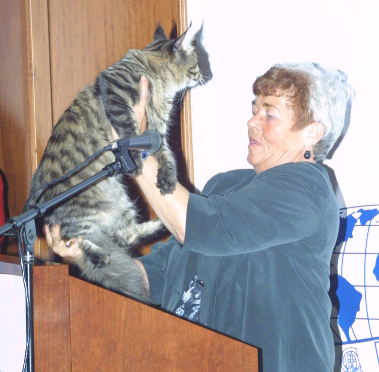 Alva Uddin and a Siberian cat.